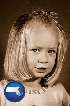 a sepia portrait of a female child - with Massachusetts icon