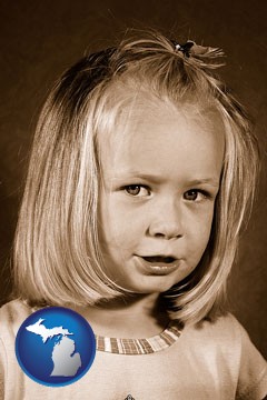 a sepia portrait of a female child - with Michigan icon